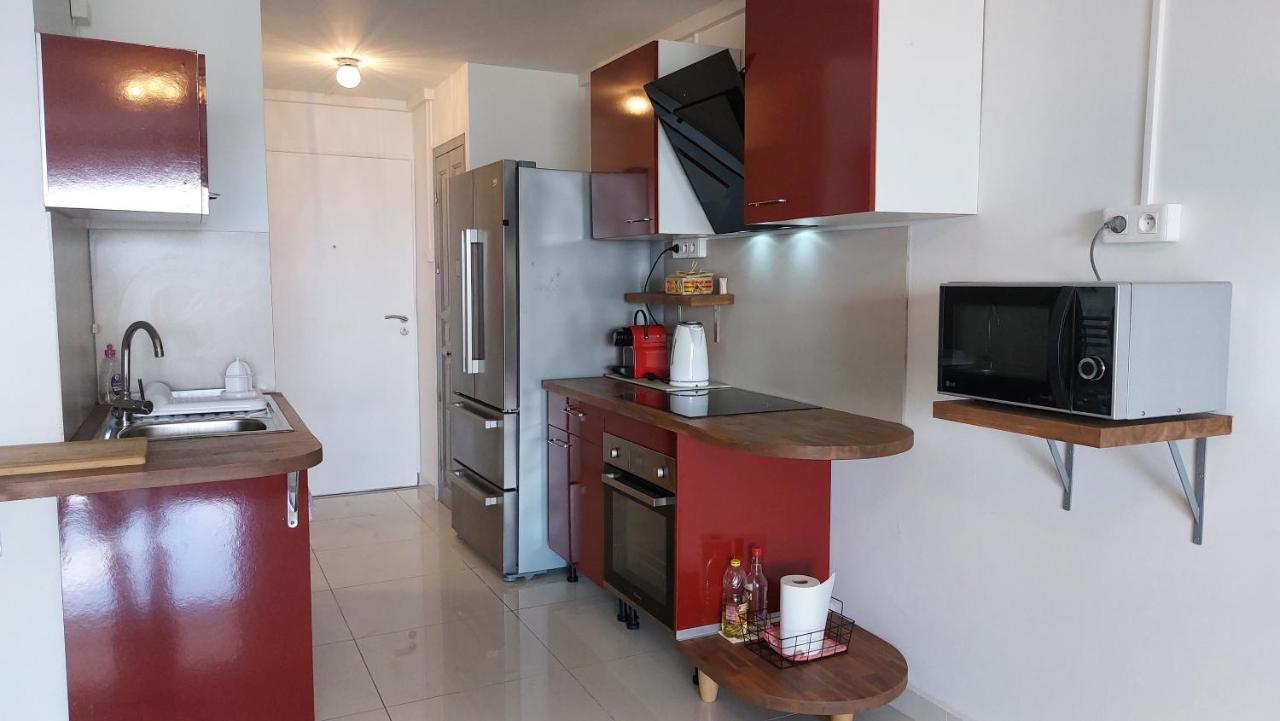 Appartement PIEDS DANS L'EAU VUE MER ACCES PLAGE ET PISCINE Marigot  Extérieur photo