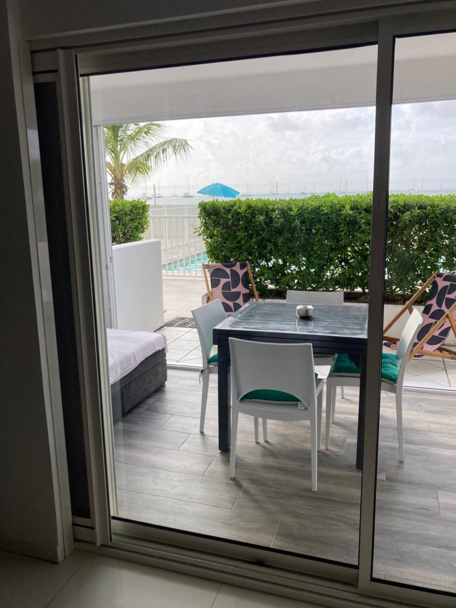 Appartement PIEDS DANS L'EAU VUE MER ACCES PLAGE ET PISCINE Marigot  Extérieur photo
